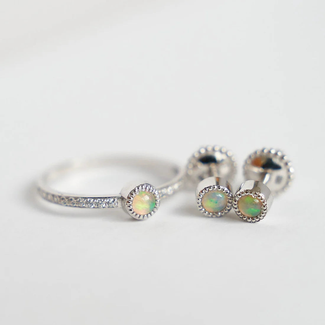 Gold Ring with Round Opal and Diamonds