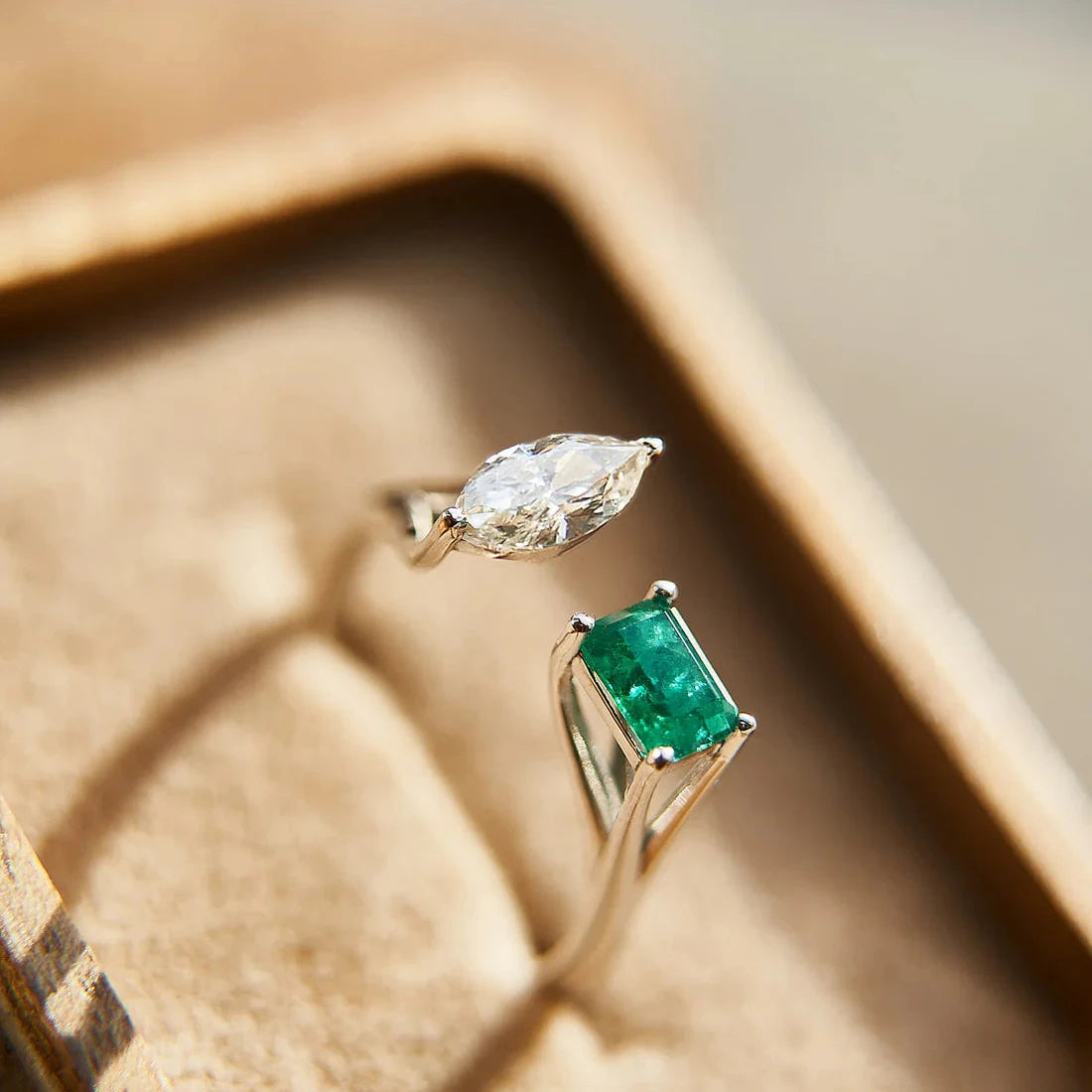 Gold Ring with Emerald cut Emerald and Marquise Diamond