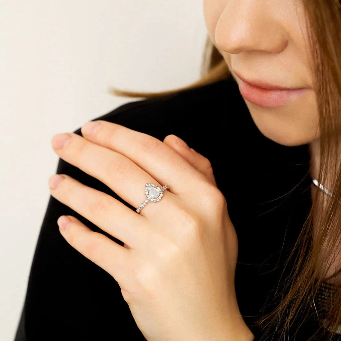 Gold Ring with Pear Opal and Diamonds