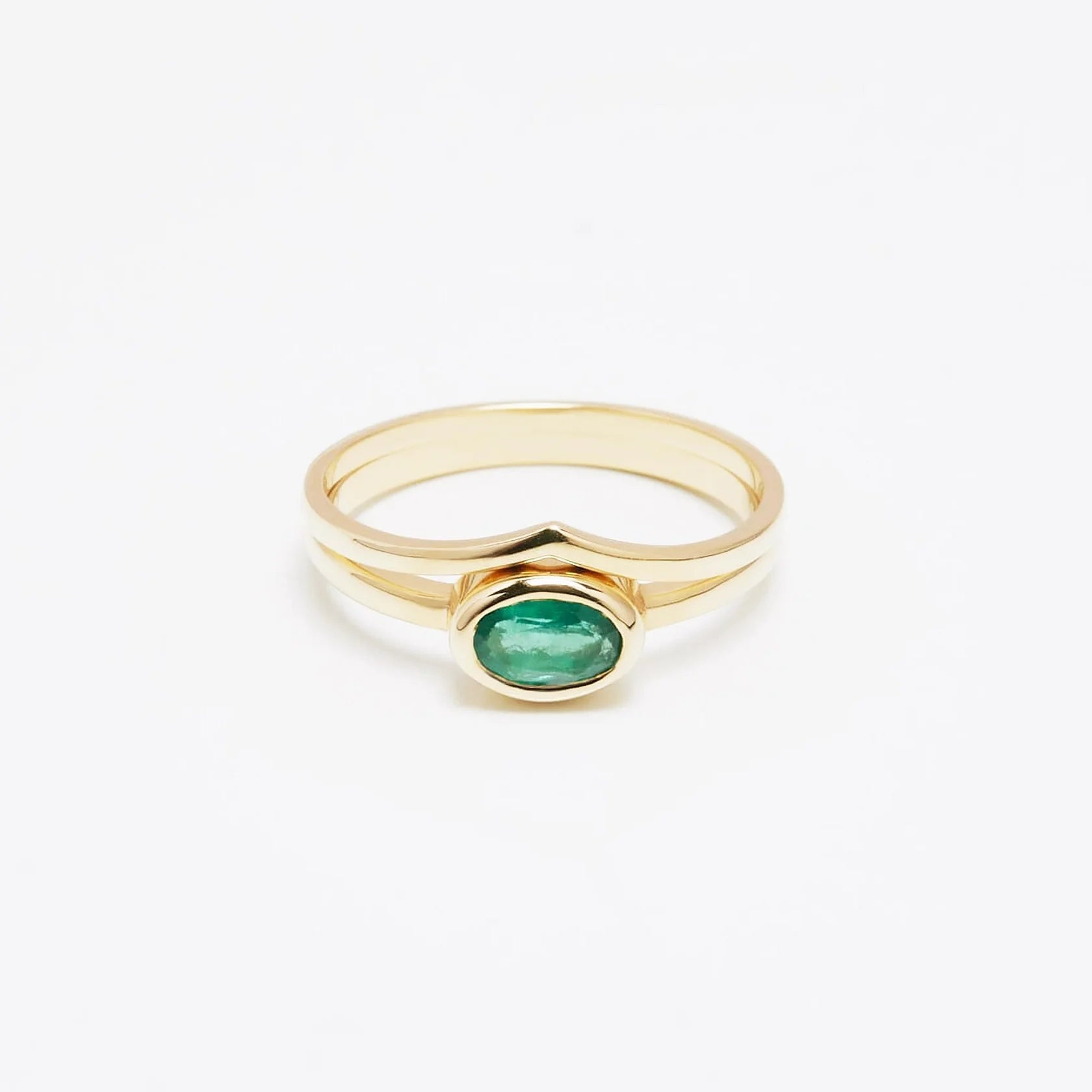 Gold Rings set with Emerald