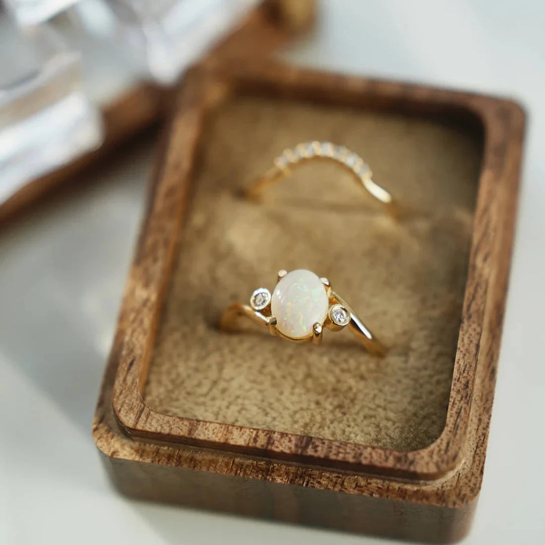 Gold Ring set with Oval cut Opal and Diamonds