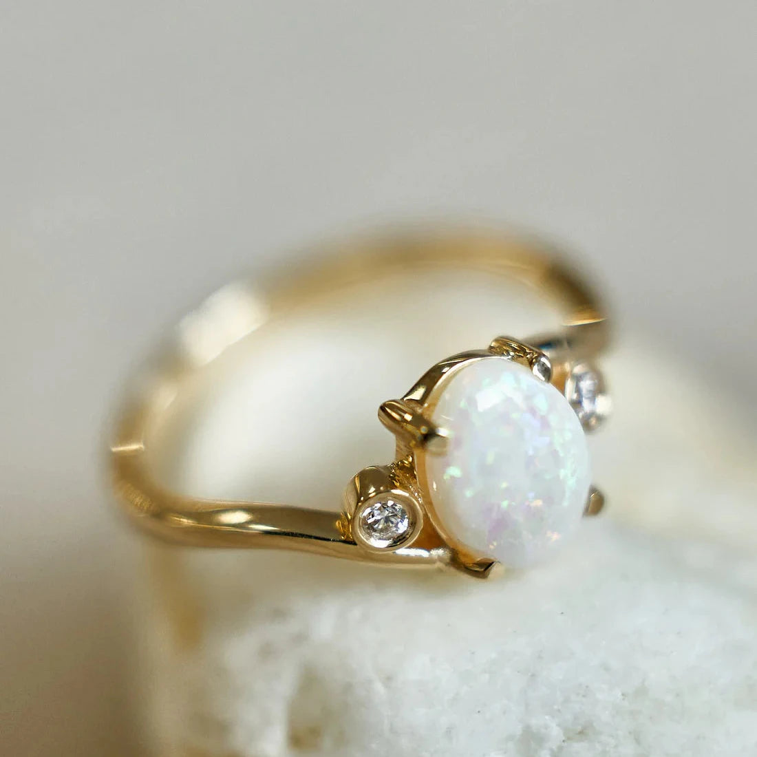 Gold Ring with Oval Opal and Diamonds