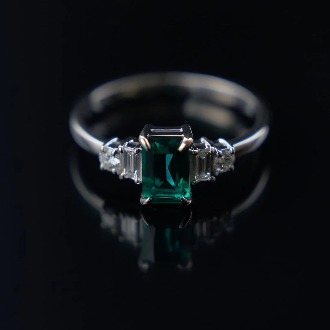 Gold Ring with Emerald cut Emerald and Diamonds