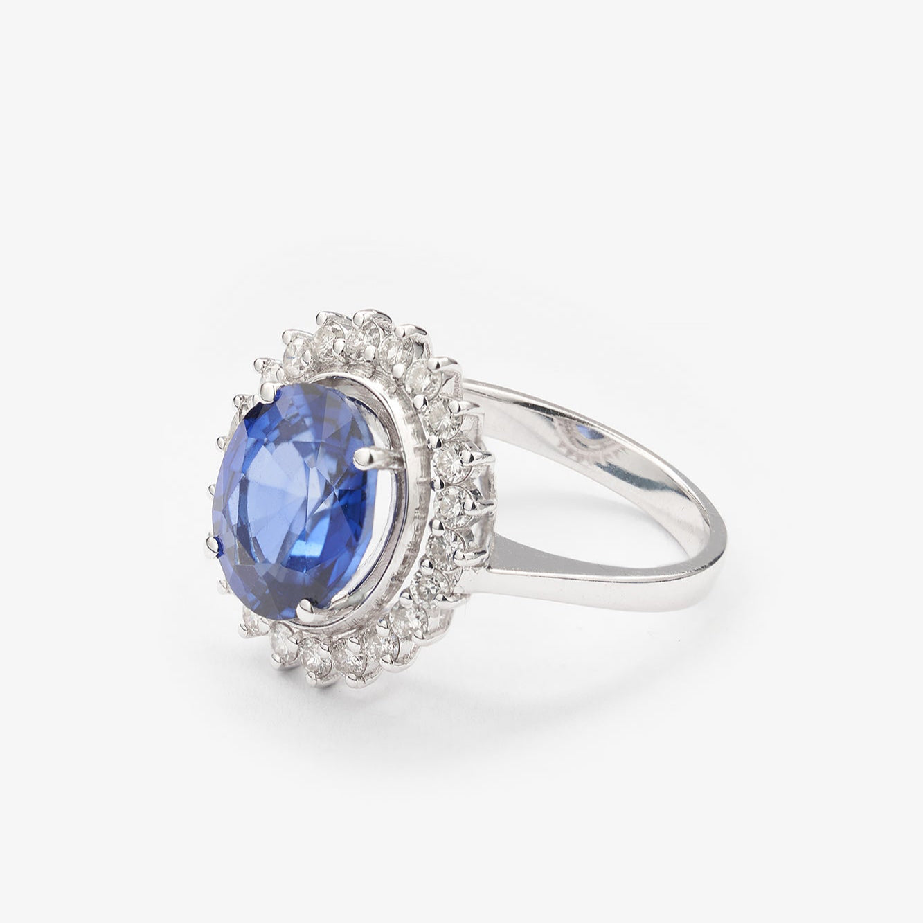 Gold Ring with Oval Sapphire and Diamonds