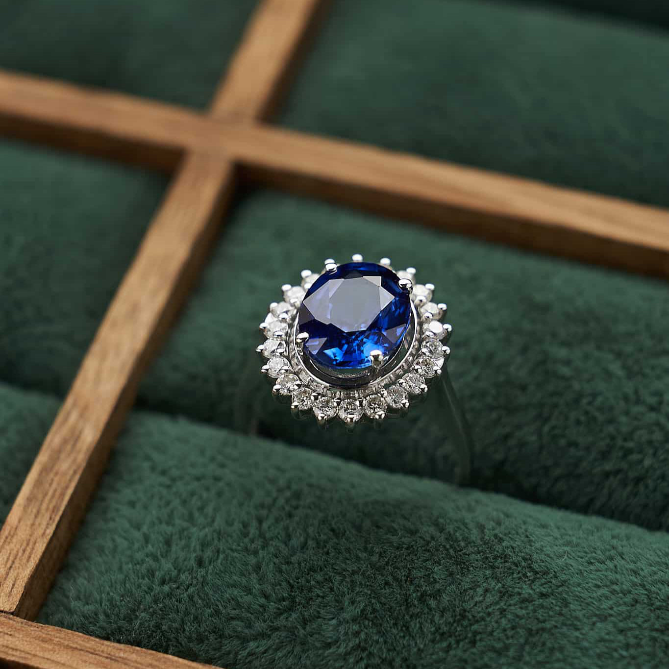 Gold Ring with Oval Sapphire and Diamonds