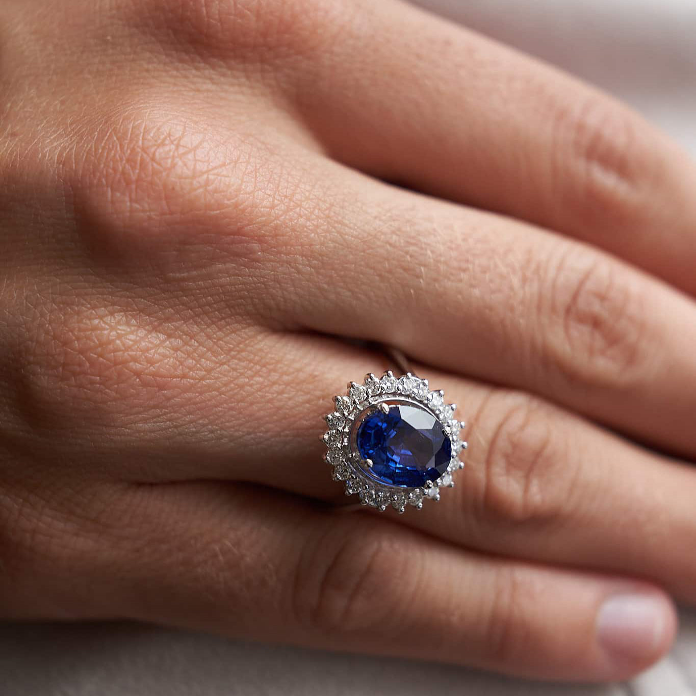 Gold Ring with Oval Sapphire and Diamonds