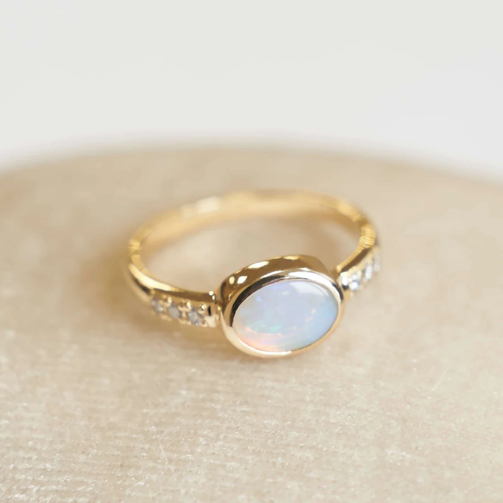 Gold Ring with Oval Opal and Diamonds