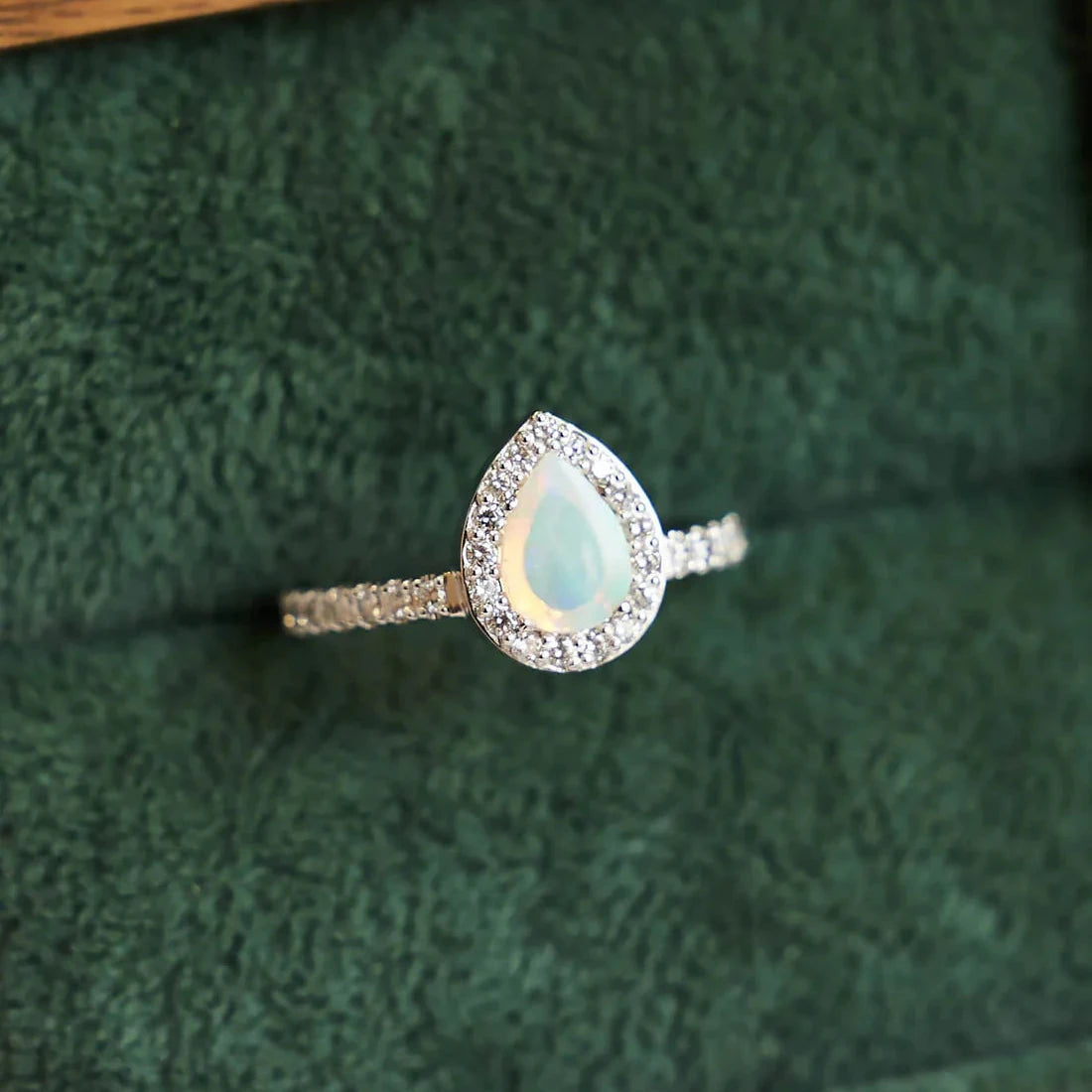 Gold Ring with Pear Opal and Diamonds