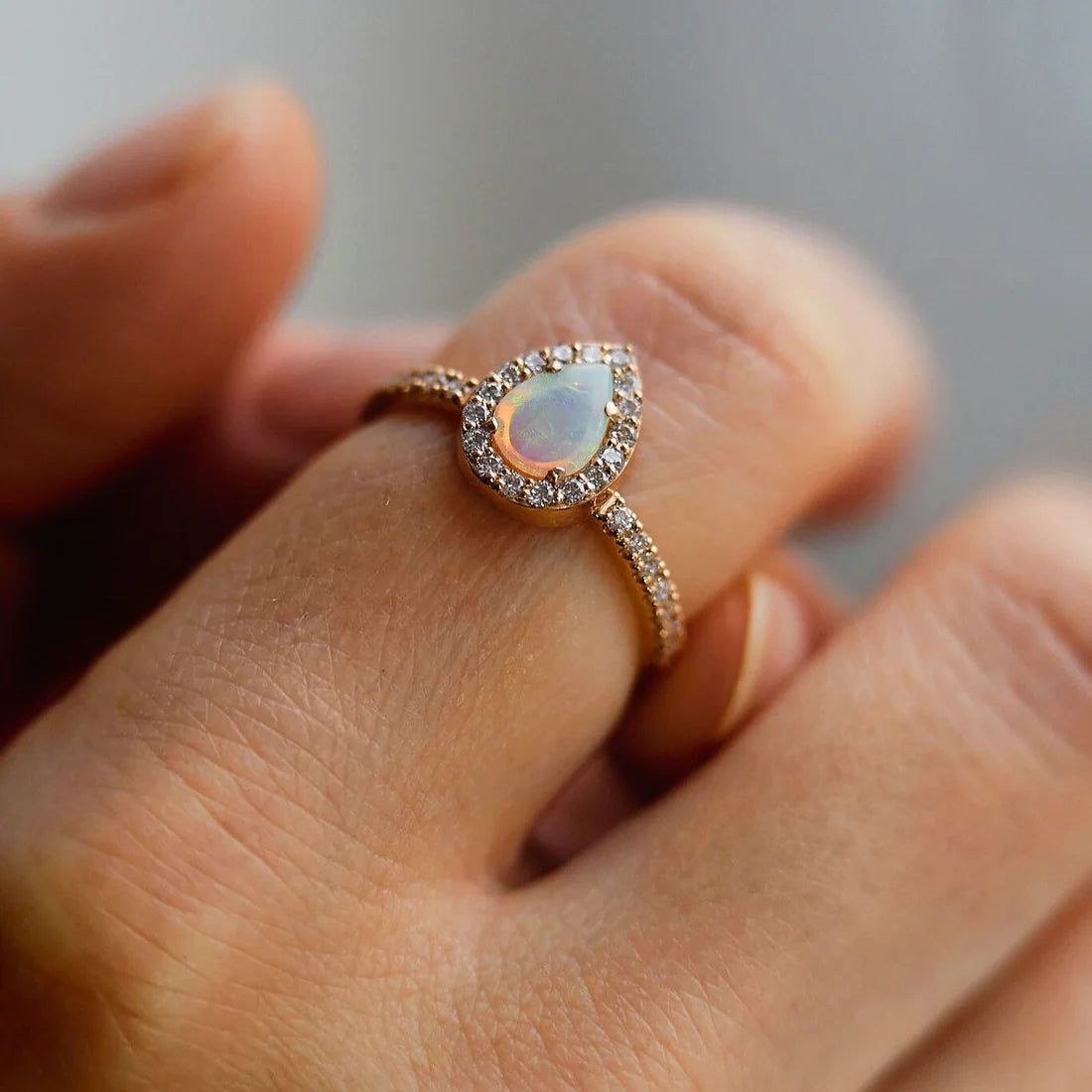 Gold Ring with Pear Opal and Diamonds