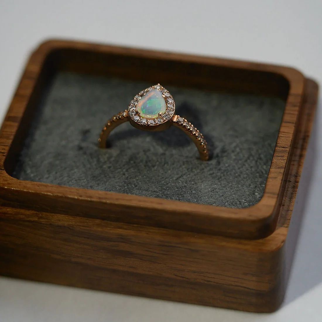 Gold Ring with Pear Opal and Diamonds