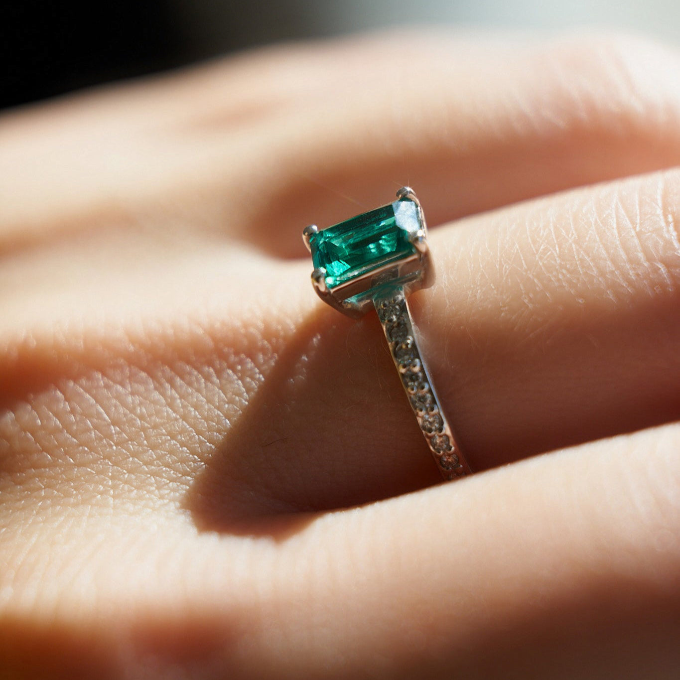 Gold Ring with Emerald cut Emerald and Diamonds