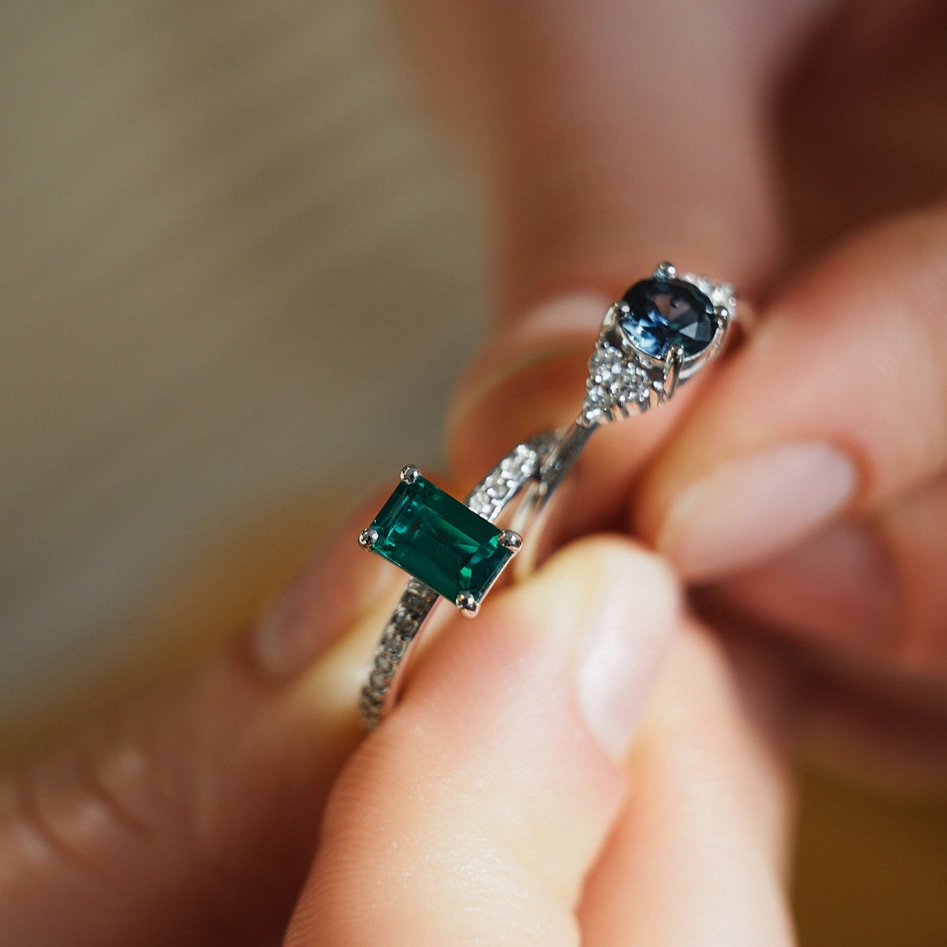 Gold Ring with Emerald cut Emerald and Diamonds
