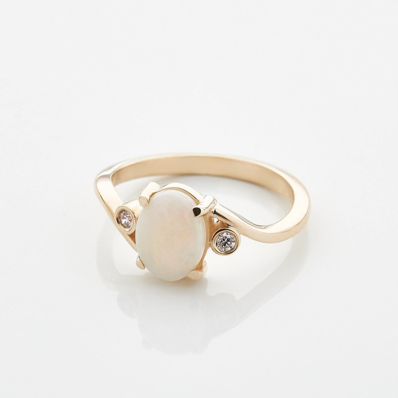 Gold Ring with Oval Opal and Diamonds