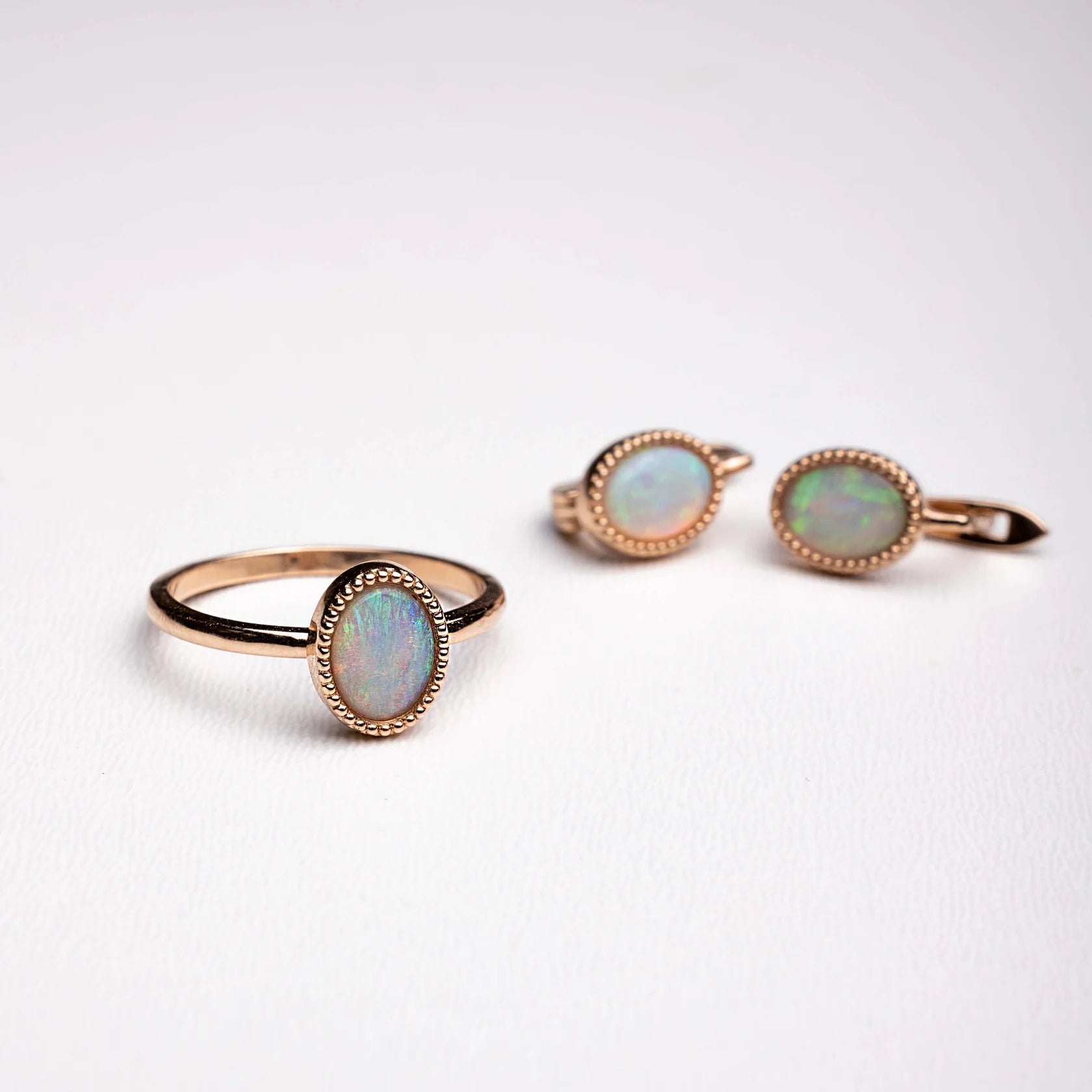 Gold Earrings with Oval cut Opals