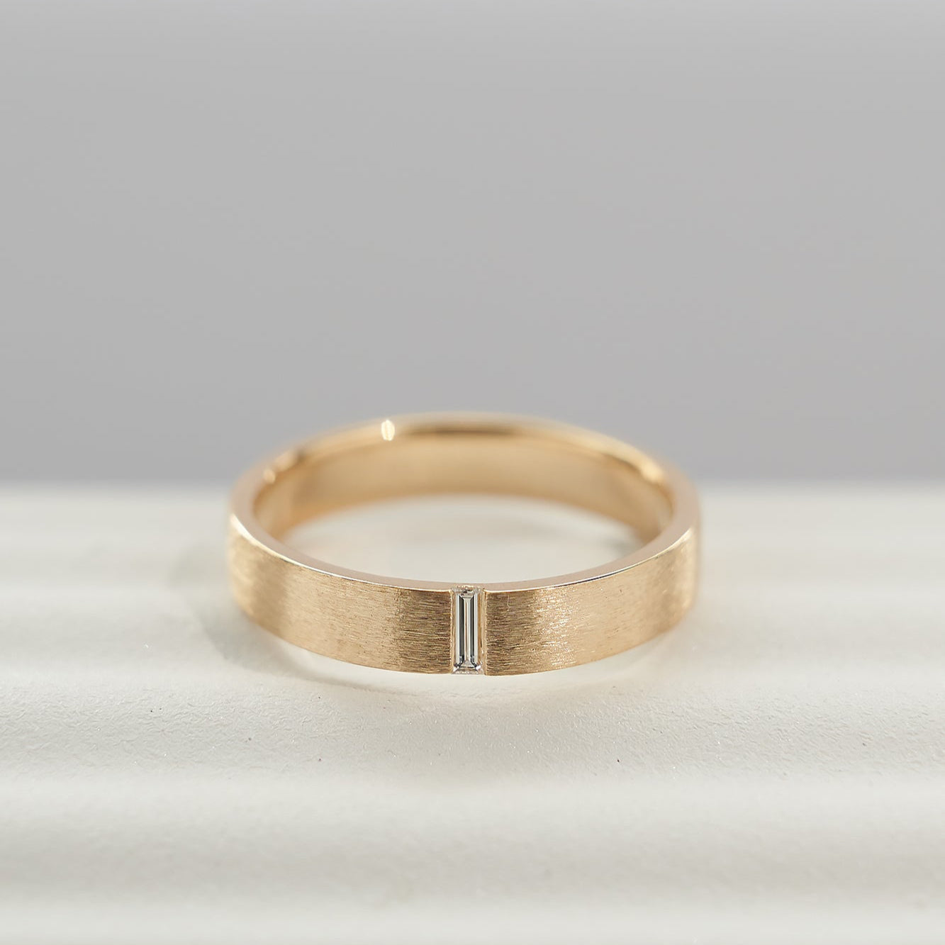 Gold Wedding band with diamonds