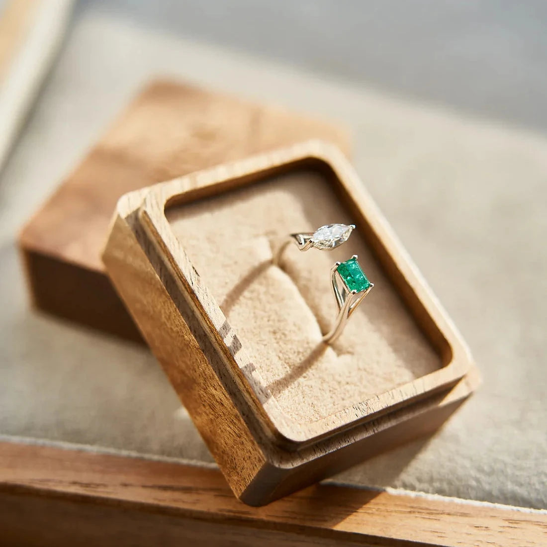 Gold Ring with Emerald cut Emerald and Marquise Diamond