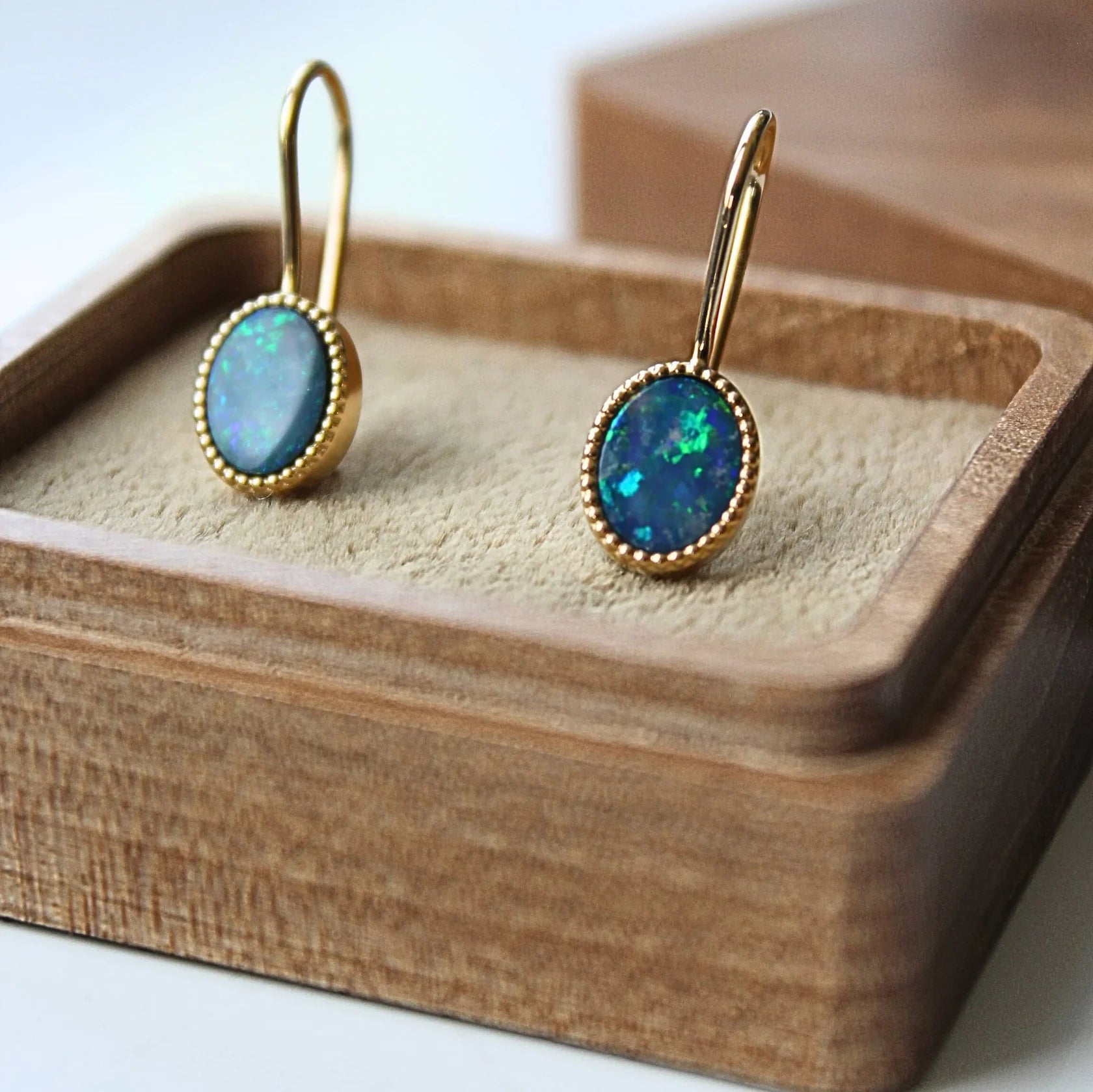 Gold Earrings with Oval cut Opal