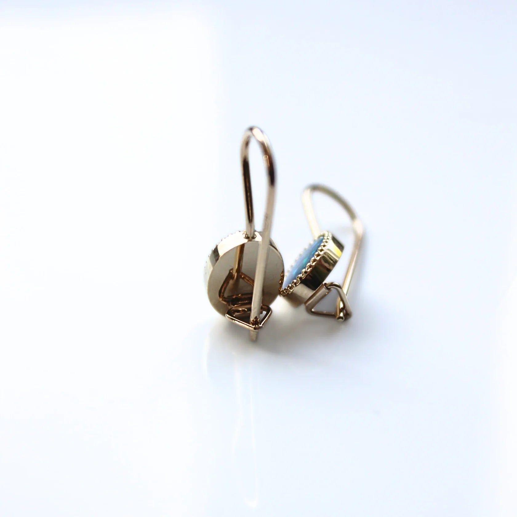 Gold Earrings with Oval cut Opal