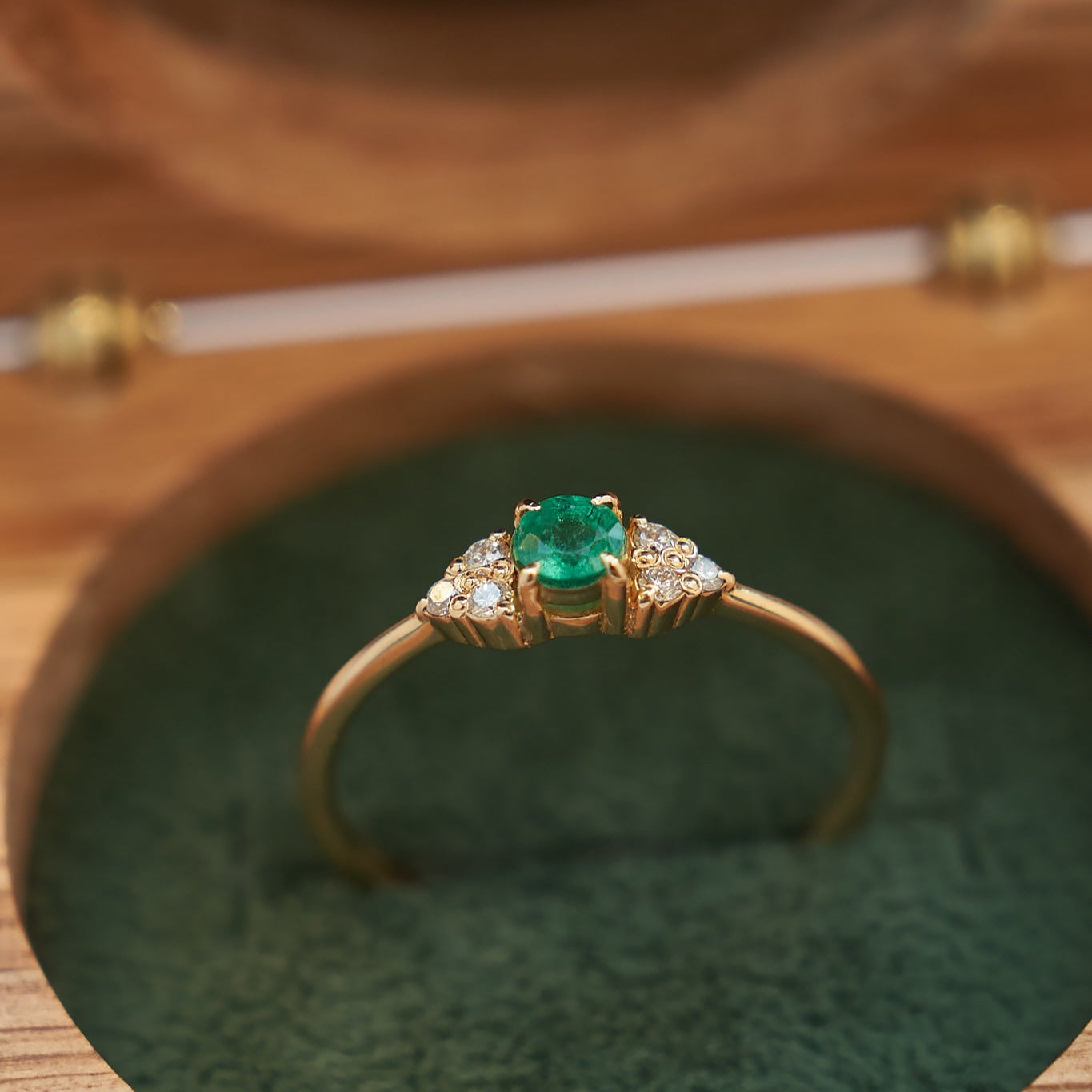 Gold Ring with Round cut Emerald and Diamonds