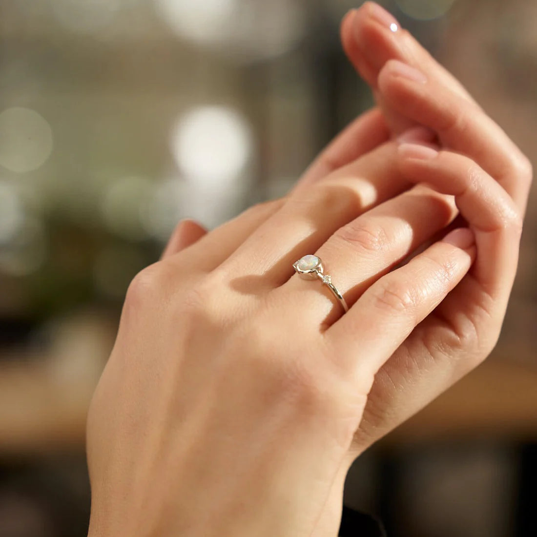 Gold Ring with Round Opal and Diamonds