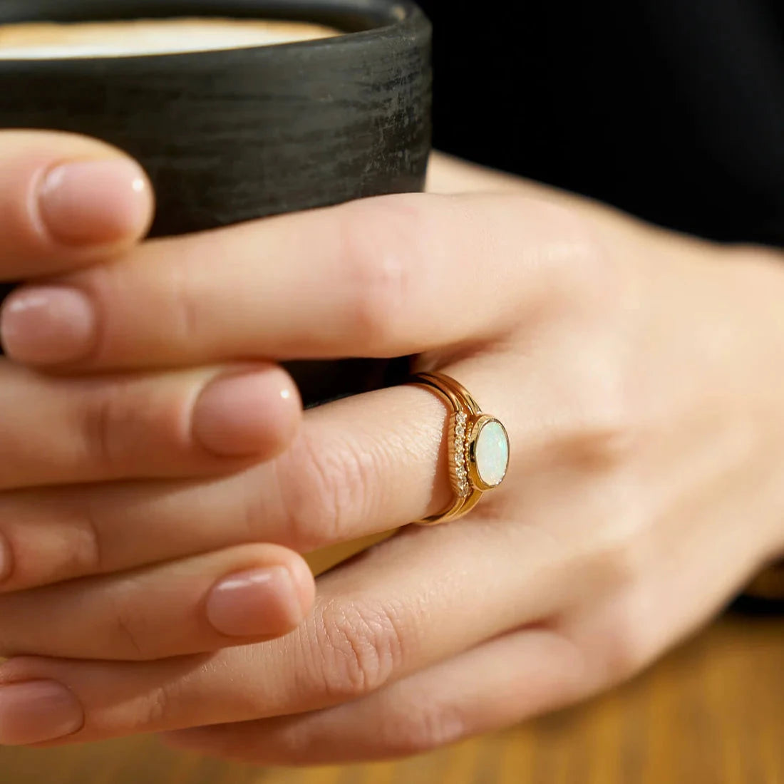 Gold Ring set with Oval cut Opal and Diamonds