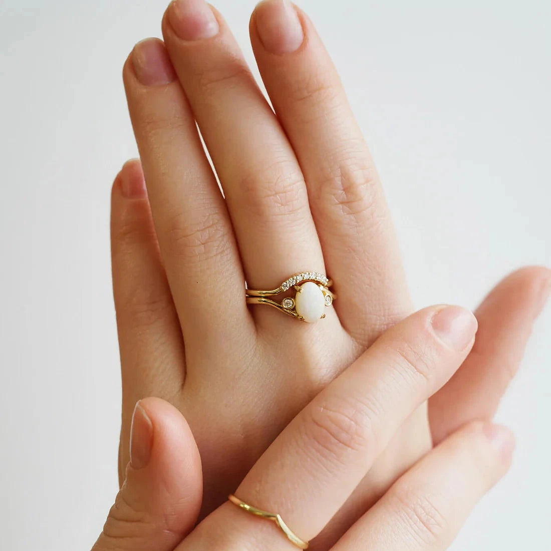 Gold Ring set with Oval cut Opal and Diamonds