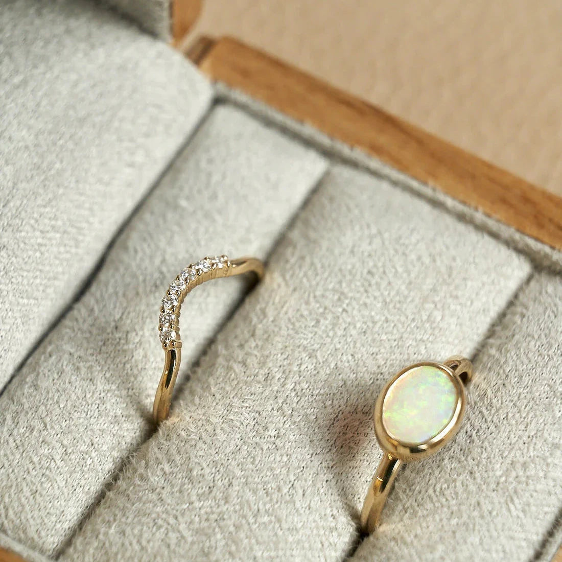 Gold Ring set with Oval cut Opal and Diamonds