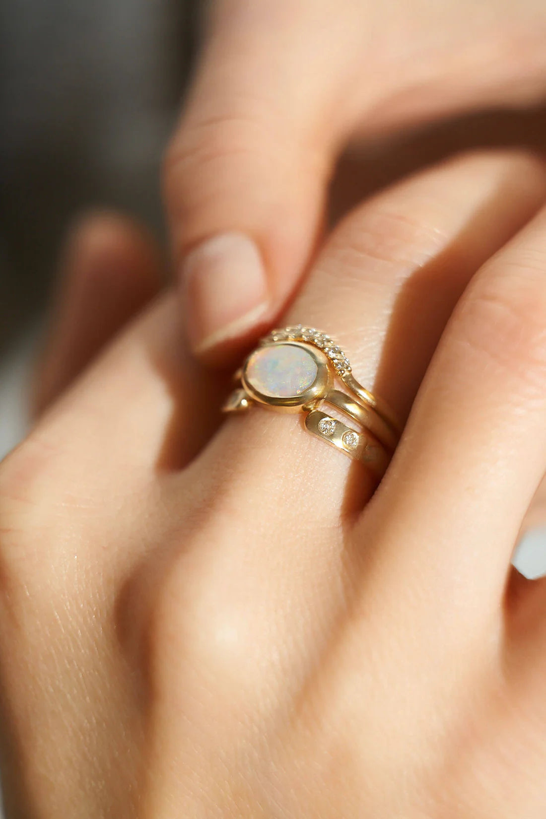 Gold Ring set with Oval cut Opal and Diamonds