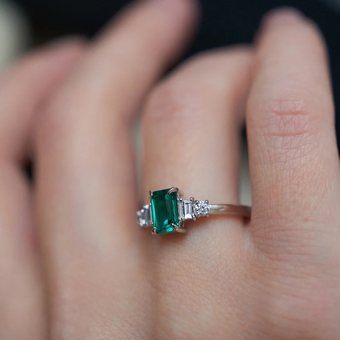 Gold Ring with Emerald cut Emerald and Diamonds