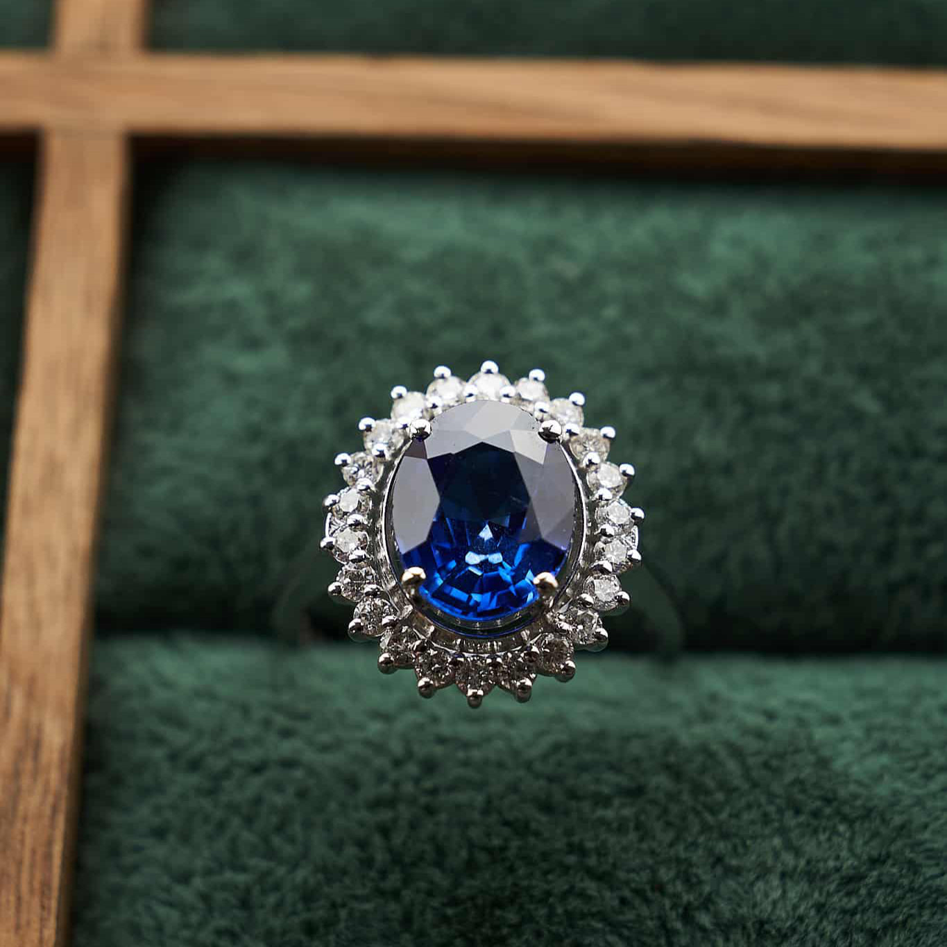 Gold Ring with Oval Sapphire and Diamonds