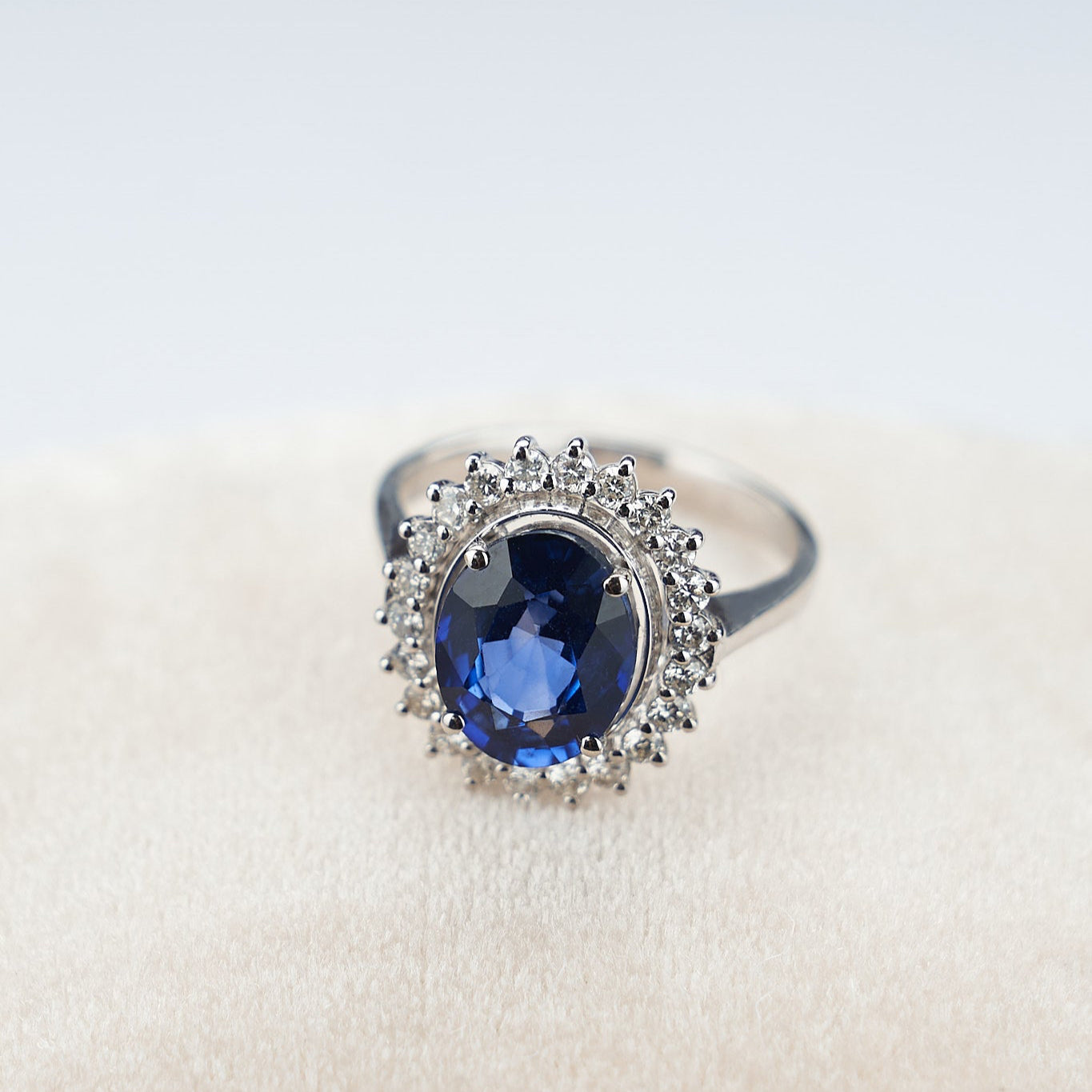 Gold Ring with Oval Sapphire and Diamonds