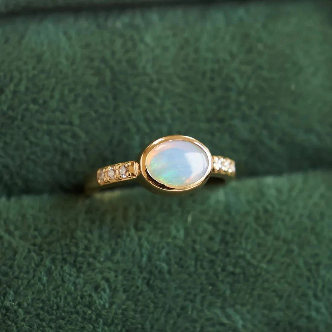 Gold Ring with Oval Opal and Diamonds