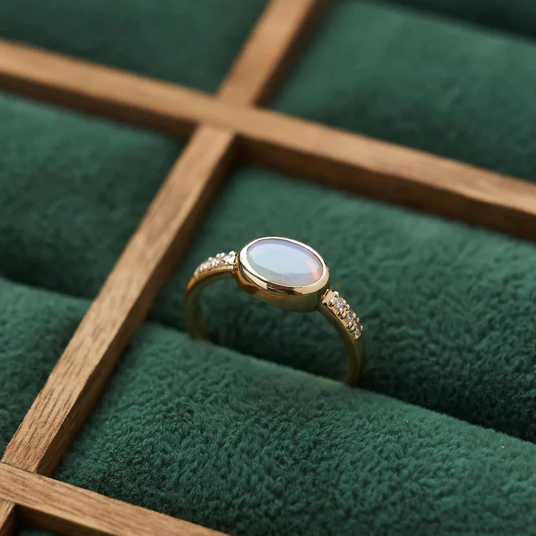 Gold Ring with Oval Opal and Diamonds