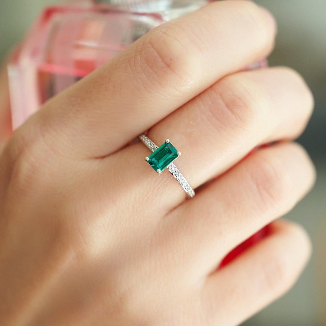 Gold Ring with Emerald cut Emerald and Diamonds