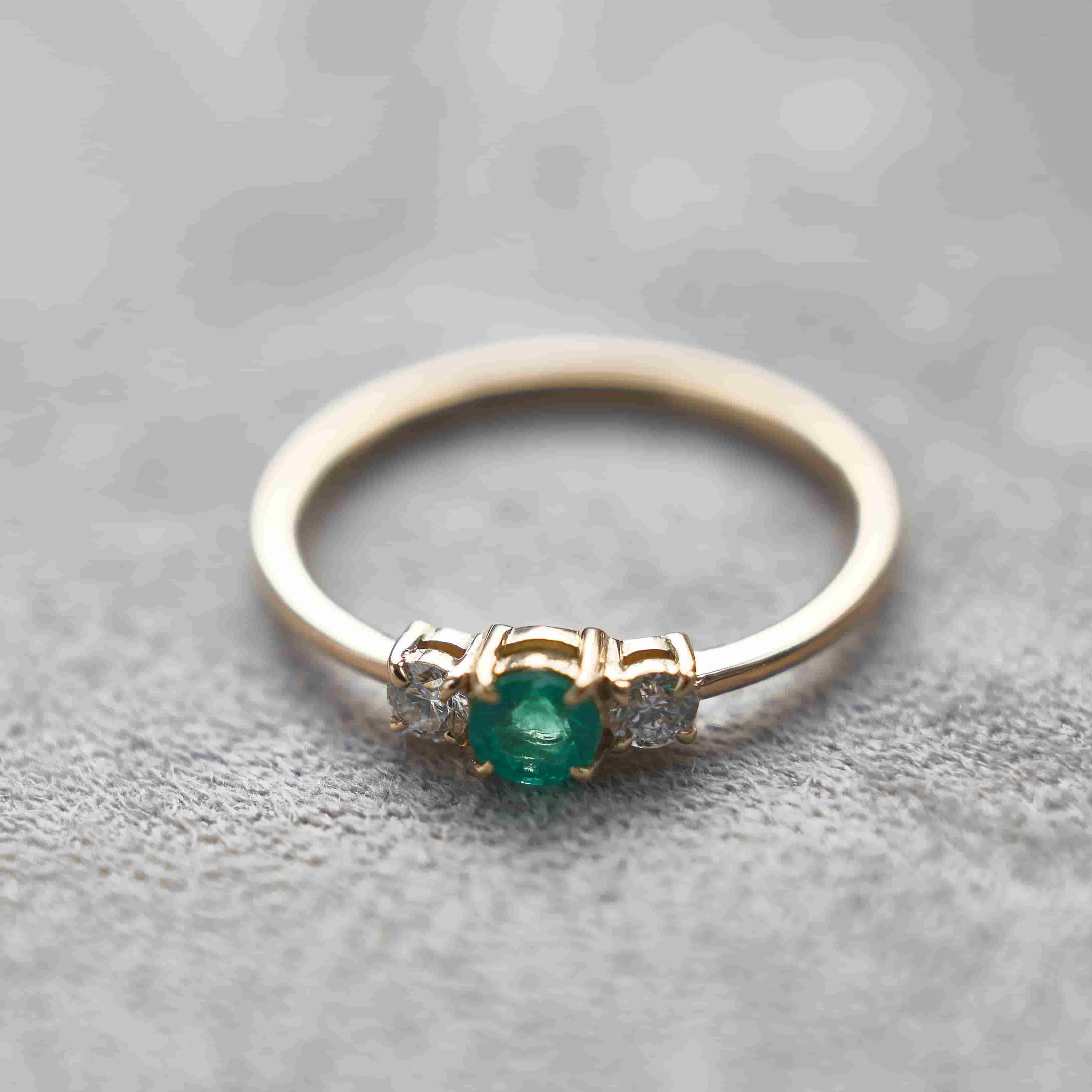 Gold Ring with Round cut Emerald and Diamonds