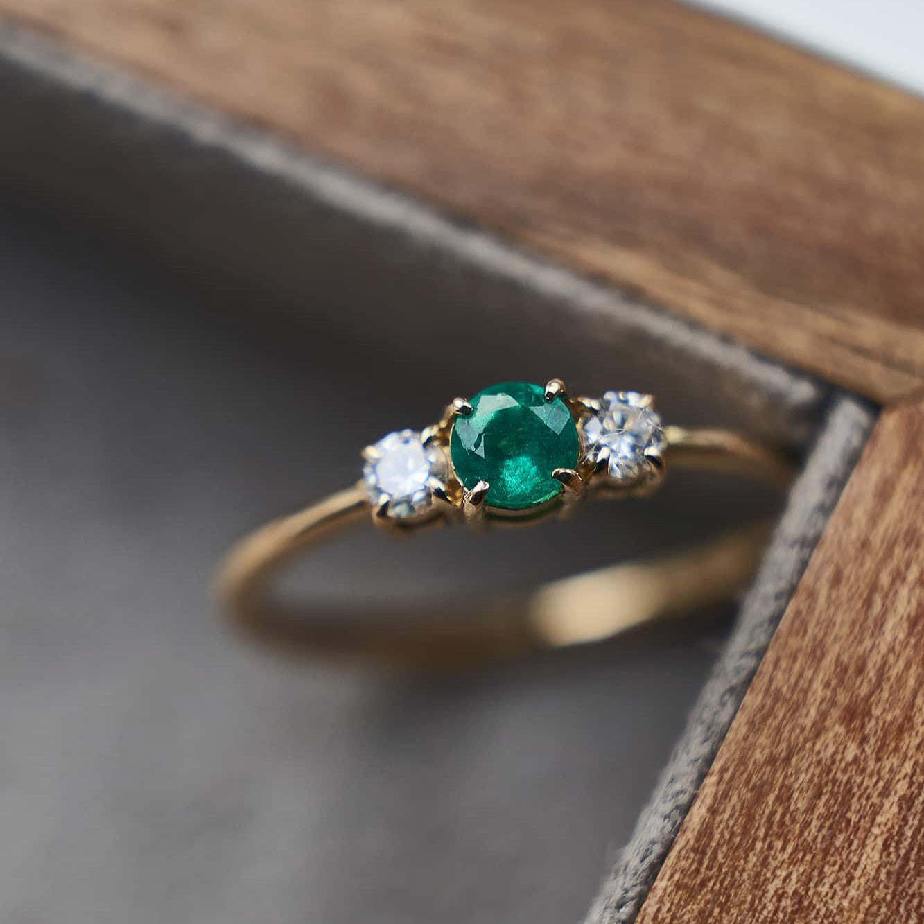 Gold Ring with Round cut Emerald and Diamonds