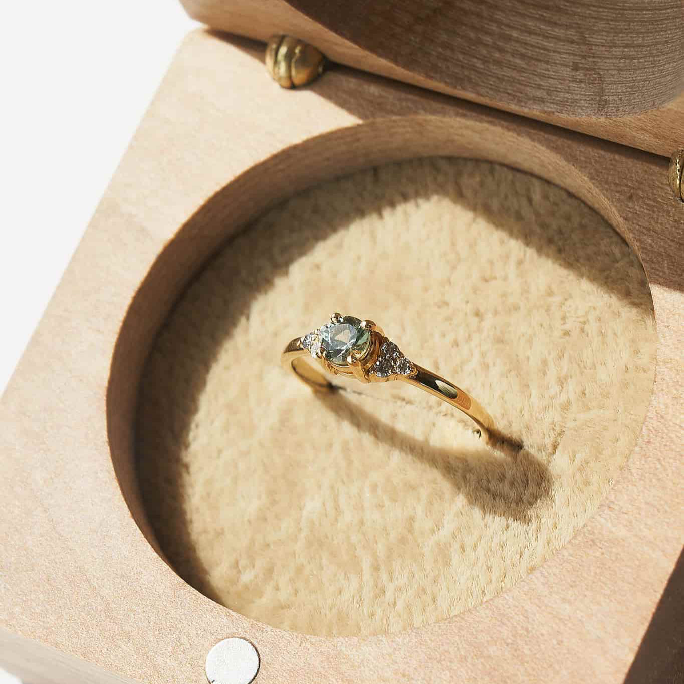 Gold Ring with Round Sapphire and Diamonds