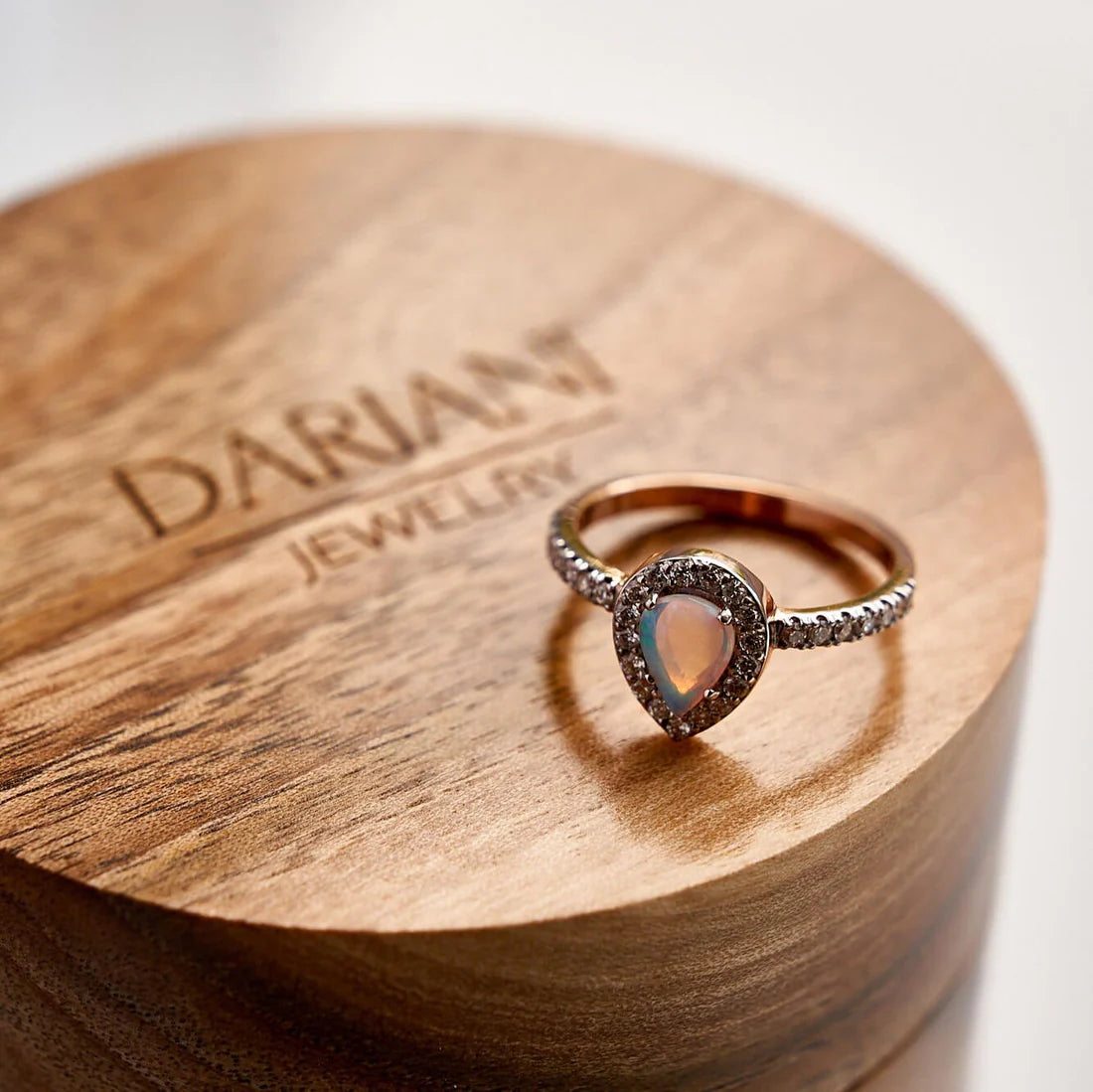 Gold Ring with Pear Opal and Diamonds