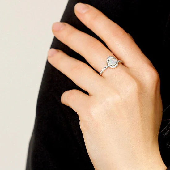 Gold Ring with Pear Opal and Diamonds