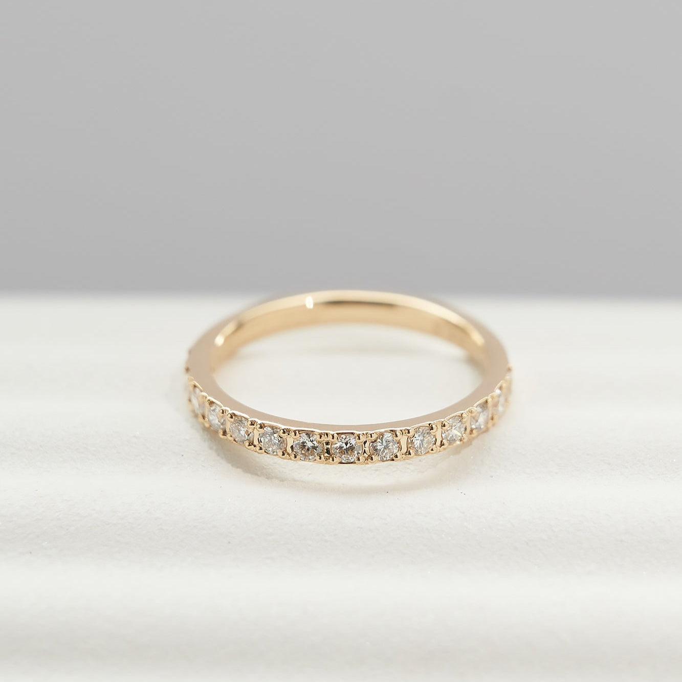 Gold Wedding band with diamonds